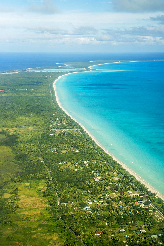 Coastline with beach and village, Ouvea island, New Caledonia, Oceania