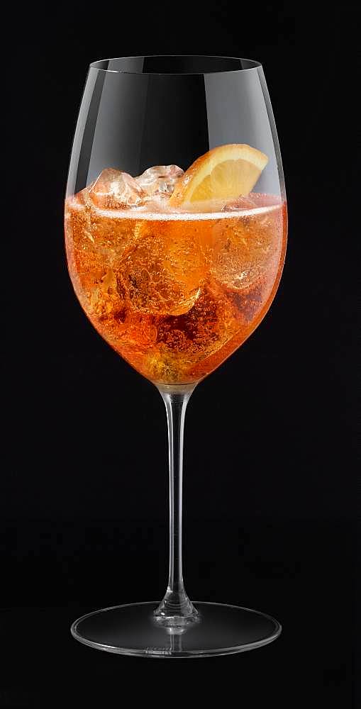 Aperol Spritz in glass, cutout, black background, Germany, Europe