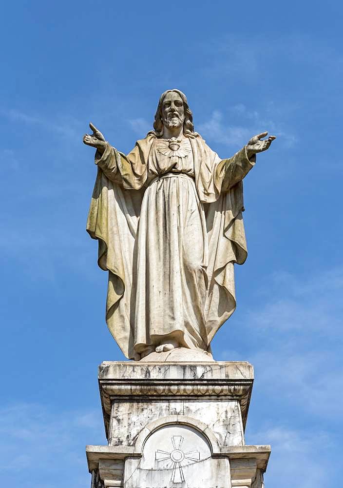 Statue of Sacred Heart of Jesus opposite the Se Cathedral, Old Goa, India, Asia