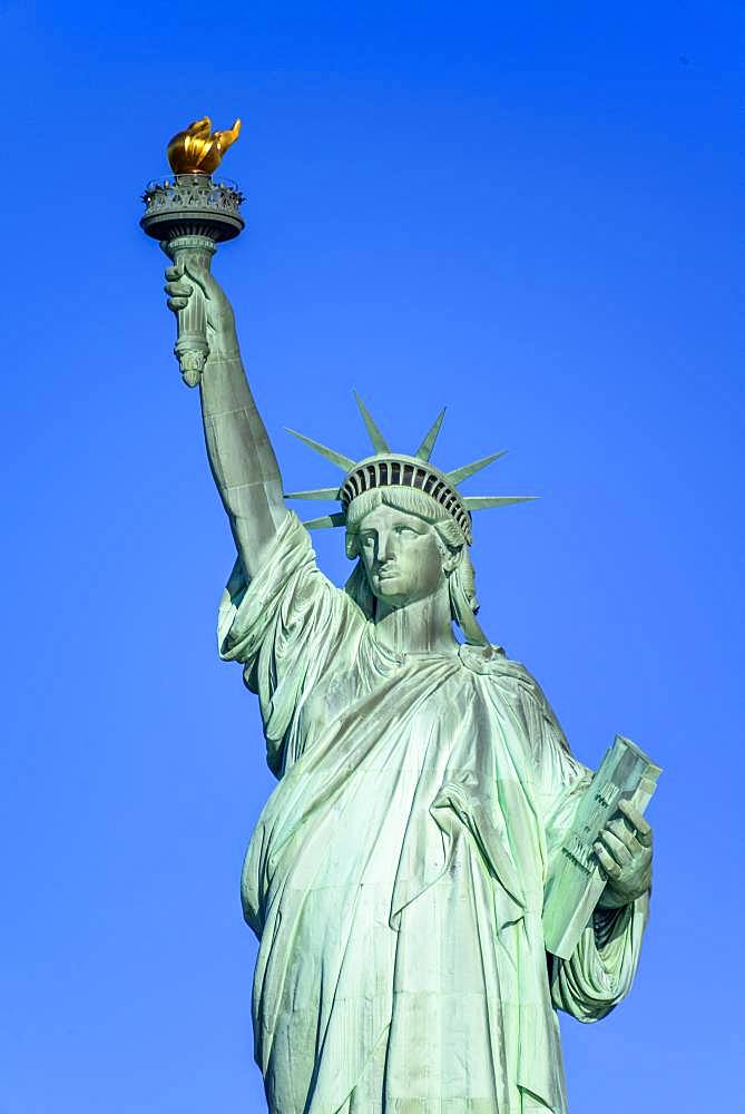 Statue of Liberty in front of blue sky, Liberty Island, Statue of Liberty National Monument, New York City, New York, USA, North America