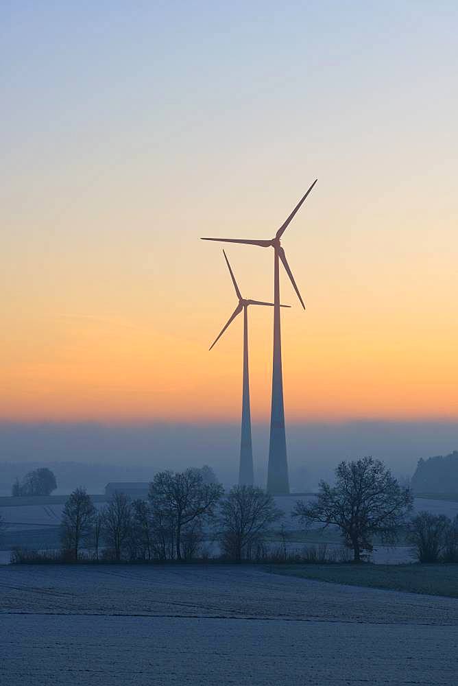 Wind power plants, silhouettes in dawn, Swabian Alb, Baden-Wuerttemberg, Germany, Europe