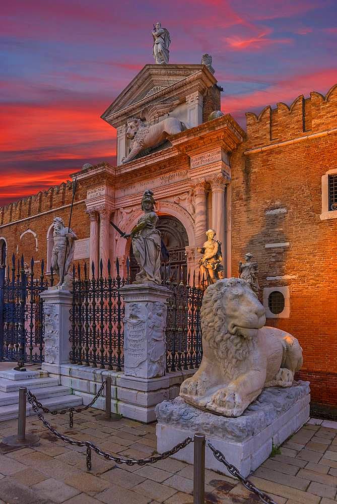 Renaissance entrance portal of the Arsenal, red evening sky, Venice, Veneto, Italy, Europe