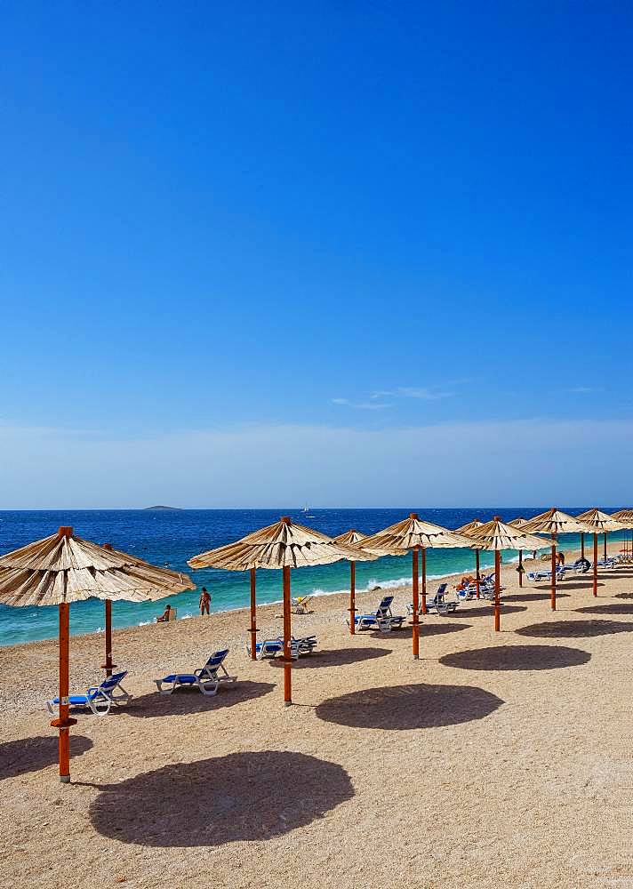 Beach with sunshades, Primosten, Croatia Adriatic coast, Central Dalmatia, Dalmatia, Croatia, Europe