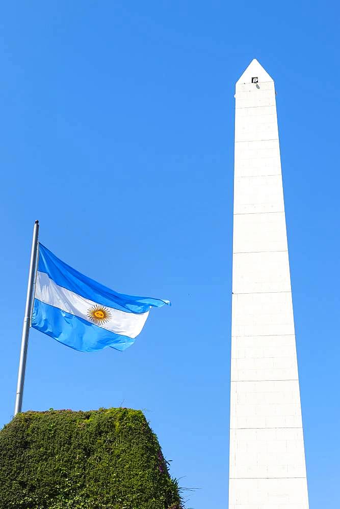 Obelisk and Argentinian flag on Avenue 9 de Julio, Buenos Aires, Argentina, South America