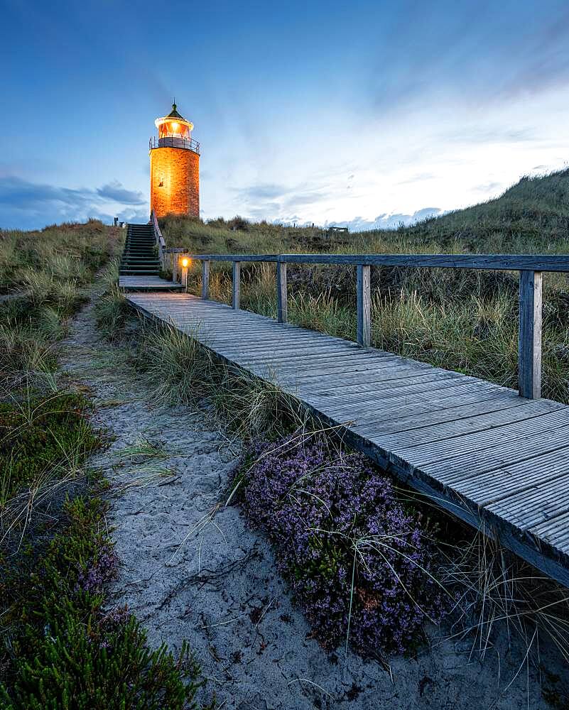 Cross light, lighthouse with sand dune at dusk, Kampen, Sylt, Germany, Europe