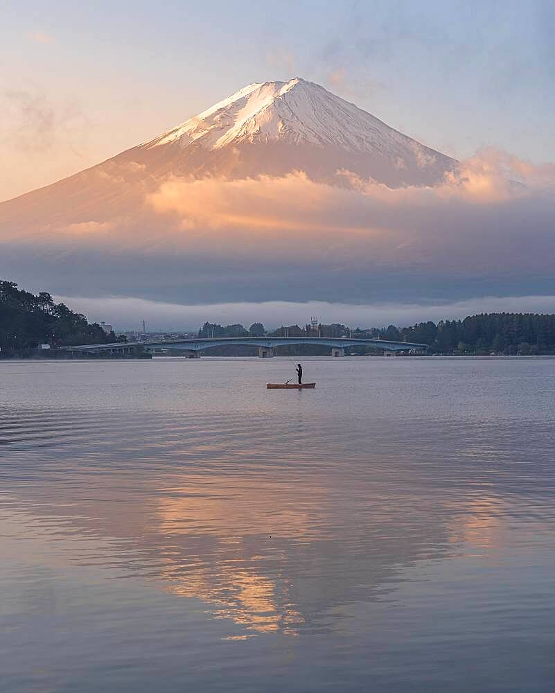 Single fisherman on Lake Kawaguchiko, Japan, Asia