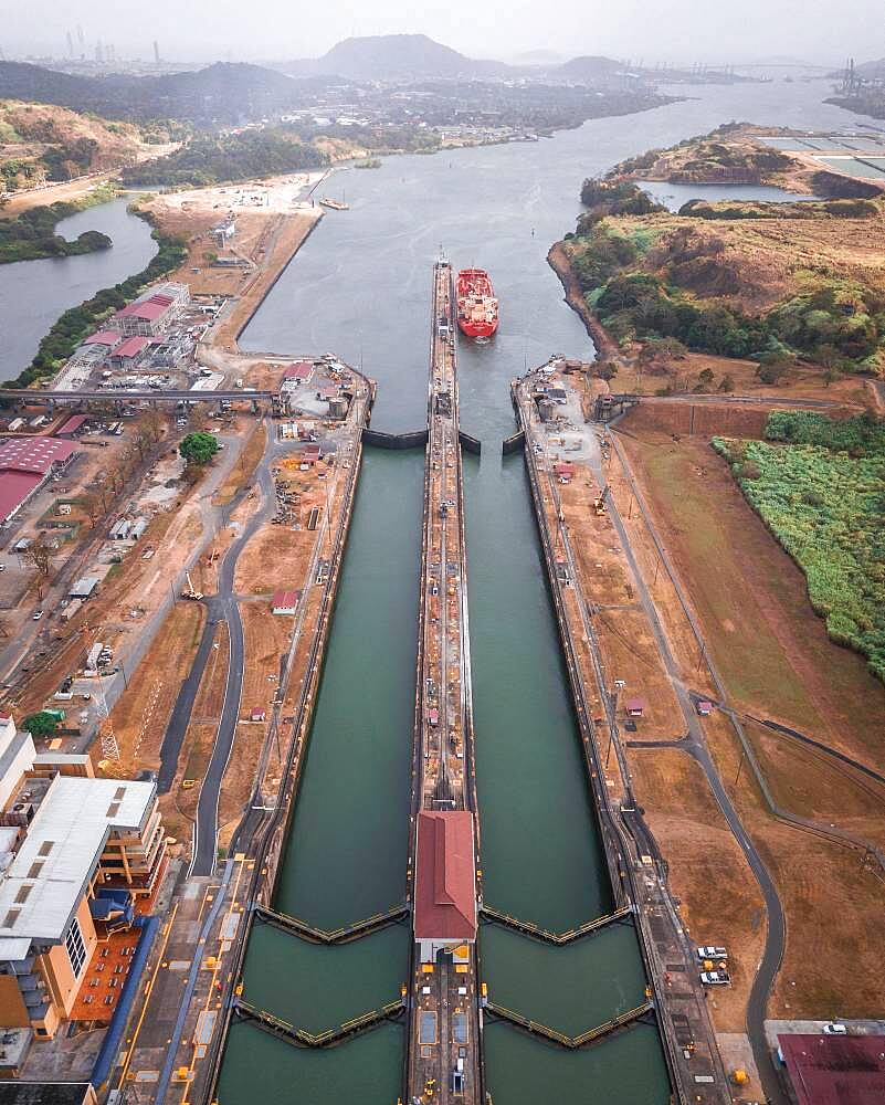 Aerial view, cargo ship at the lock in the Panama Canal from above, Mirador Miraflores, Panama, Central America