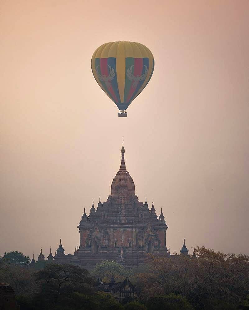 Colorful balloon in the middle of the Htilominlo Temple, Bagan, Myanmar, Asia