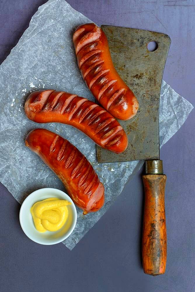 Meat sausages and skin with mustard, grilled, with cleaver, Switzerland, Europe