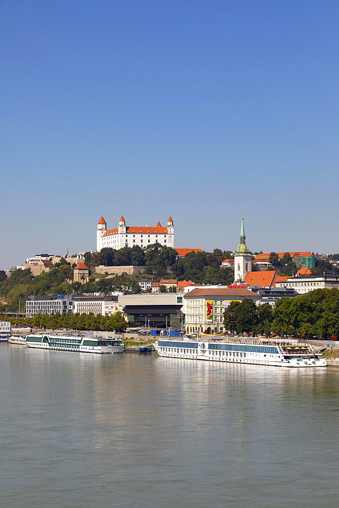 Landing stage for Danube cruise ships with a view to Bratislava Castle, Danube, Bratislava, Slovakia, Europe