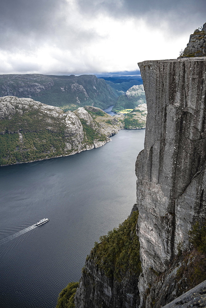 Rock plateau, rock pulpit Preikestolen, boat on the Lysefjord, Ryfylke, Rogaland, Norway, Europe