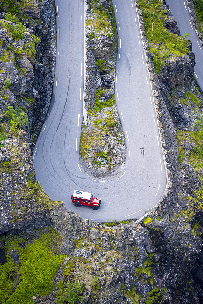 Single car, hairpin bend at the mountain road Trollstigen, near Andalsnes, More og Romsdal, Vestland, Norway, Europe