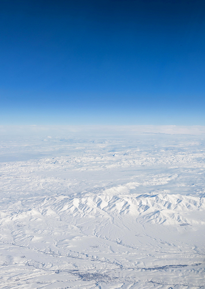 View of mountains and snowy landscape from the airplane, airplane wing of an Airbus A380, aerial view, Anatolia, Northeastern Turkey, Turkey, Asia