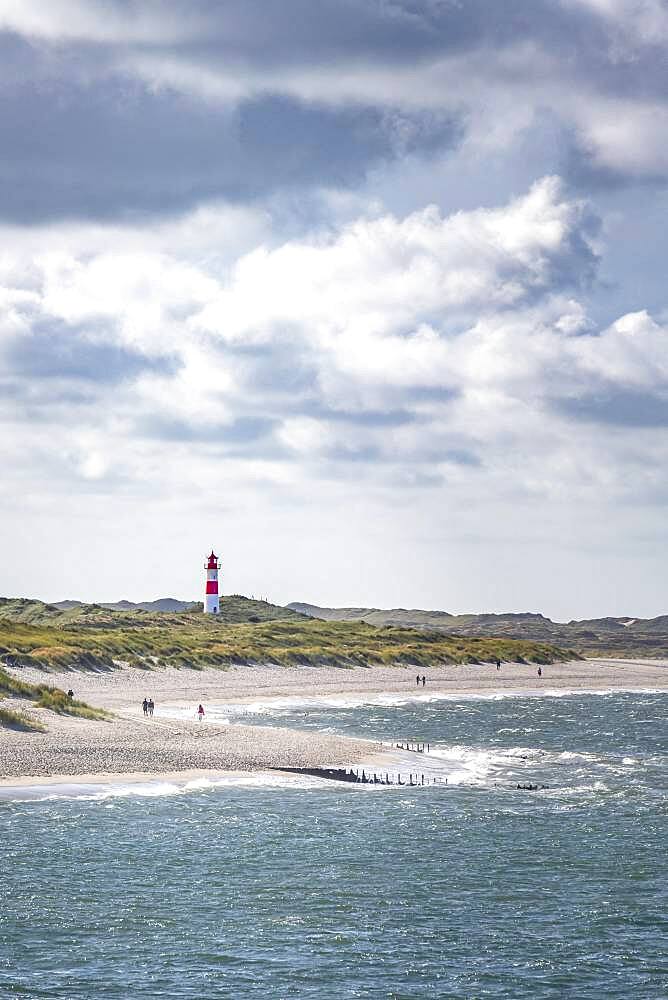 Sand beach, sea and red-white lighthouse List-Ost in the dunes, Ellenbogen, Sylt, North Frisian Island, North Sea, North Frisia, Schleswig-Holstein, Germany, Europe