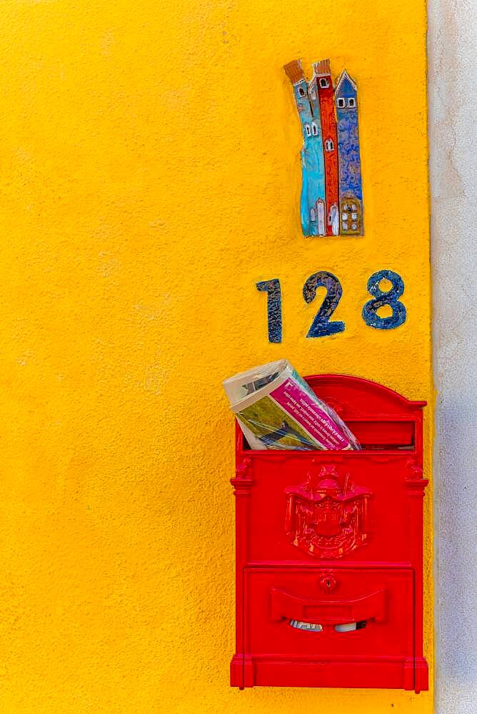 Letterbox and house number on a yellow house wall, Burano Island, Venice, Veneto, Italy, Europe