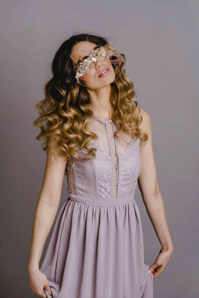 Flower girl, Young woman with flower wreath in romantic dress