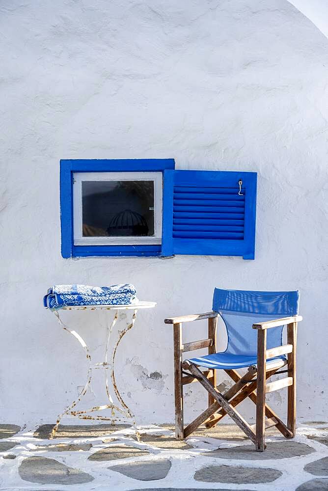 Cycladic house, Blue window and blue chair, Paros, Cyclades, Greece, Europe