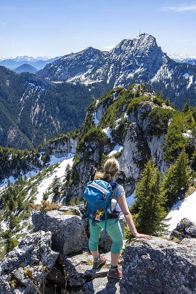 Hiker on the summit of Breitenstein, behind Wendelstein, Fischbachau, Bavaria, Germany, Europe