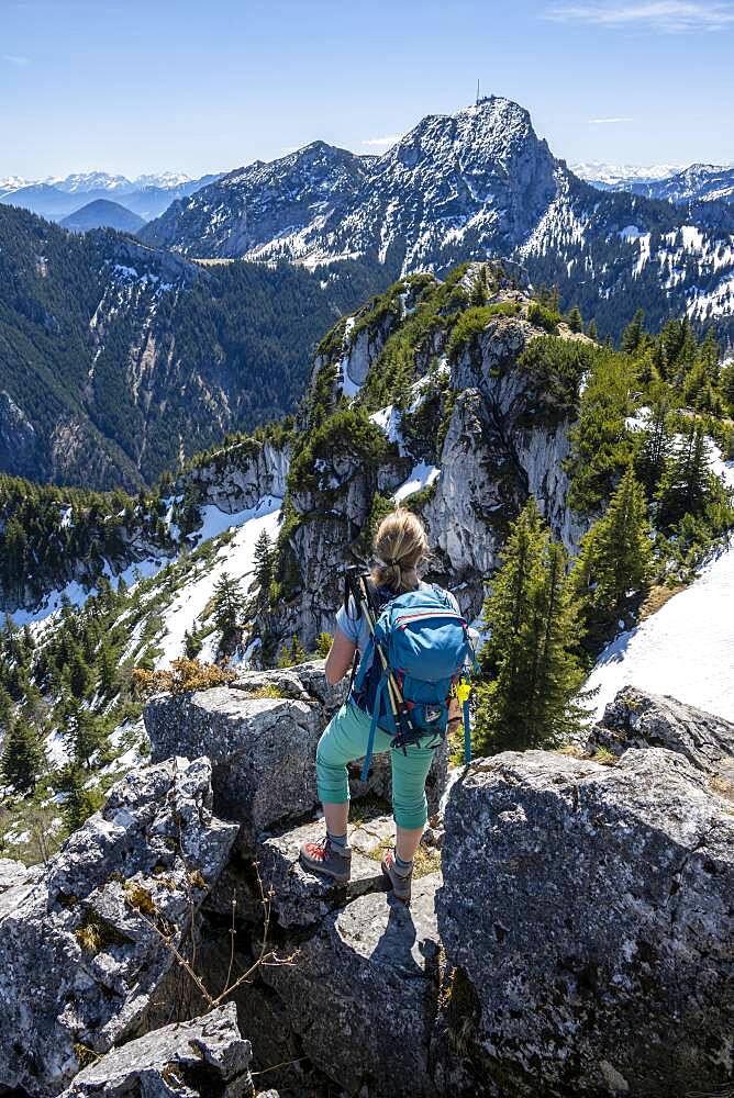 Hiker on the summit of Breitenstein, behind Wendelstein, Fischbachau, Bavaria, Germany, Europe