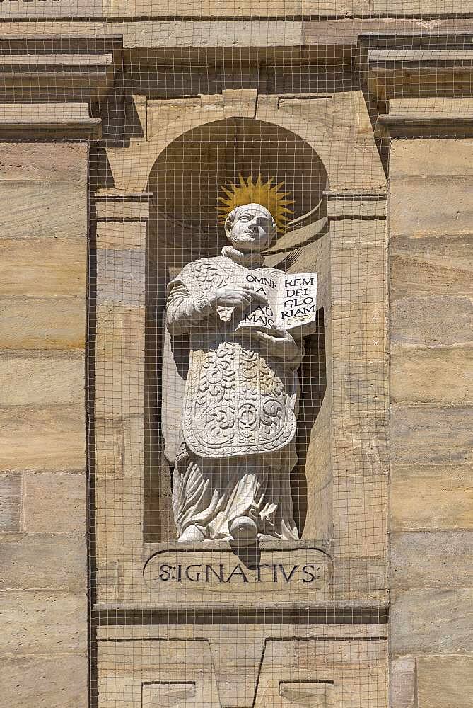 Sculpture of Ignatius of Loyola on the main facade of the parish church of St.Martin, Bamberg, Upper Franconia, Bavaria, Germany, Europe