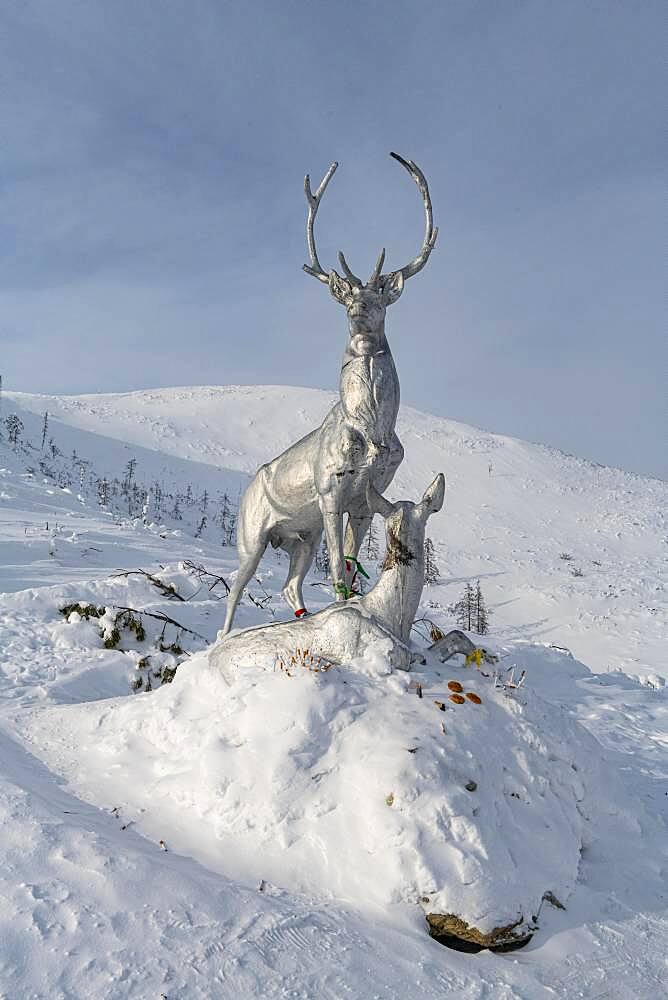 Deer monument on a snow covered mountain pass, Suntar-Khayata mountain Range, Road of Bones, Sakha Republic, Yakutia, Russia, Europe