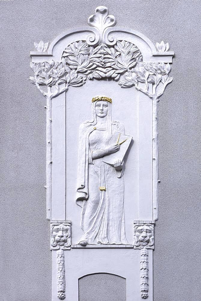 Art Nouveau relief of a woman with compasses on a residential house from 1908, Nuremberg, Middle Franconia, Bavaria Germany