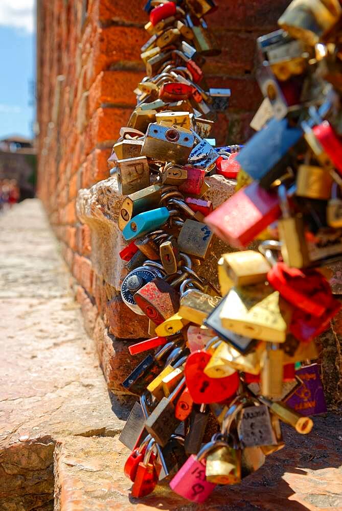 Padlocks as a sign of solidarity on the Ponte Scaligero bridge, Verona, Veneto, Italy, Europe