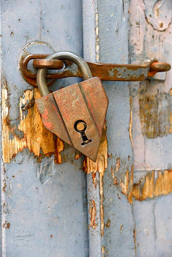 Old padlock hanging on a wooden door, Fischen, Allgaeu Alps, Allgaeu, Bavaria, Germany, Europe