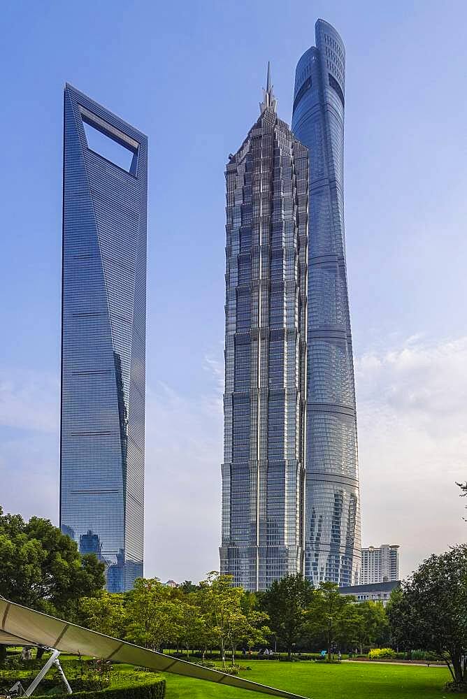 The tallest skyscrapers in the Pudong Special Economic Zone: Shanghai World Financial Center, nicknamed The Bottle Opener at 492 meters, Jin Mao Tower, nicknamed The Syringe at 420 meters, and the 632-meter Shanghai Tower, nicknamed The Twist, Shanghai, People's Republic of China