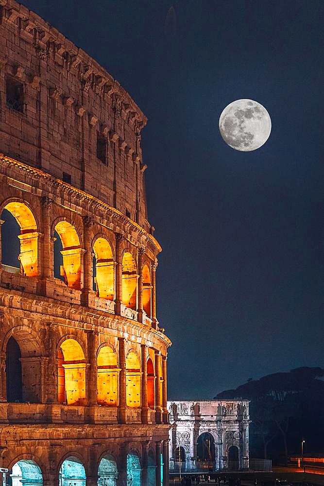 The Colosseum illuminated at night, full moon, Rome, Italy, Europe