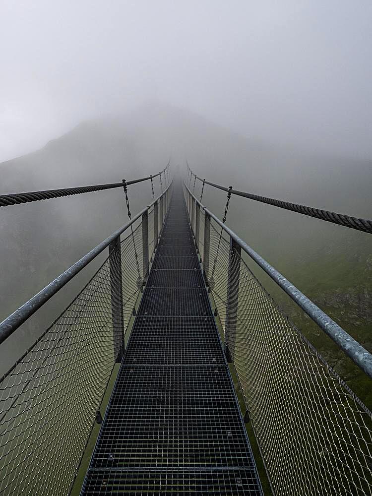 Suspension bridge in the fog, Stubnerkogel, Bad Gastein, Salzburger Land, Austria, Europe