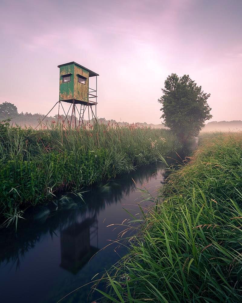 German floodplain landscape in Brandenburg with high seat on the Nuthe, Luckenwalde, Germany, Europe