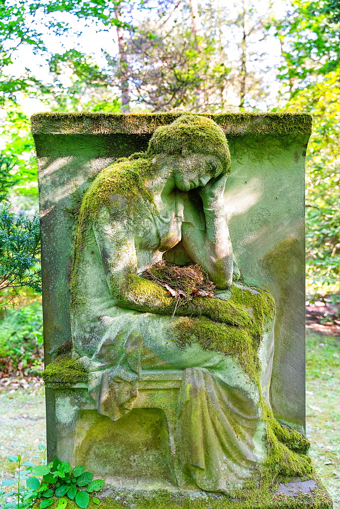 Grave sculpture with bird's nest in the lap, historical cemetery Suedwestkirchhof Stahnsdorf, Potsdam-Mittelmark, Brandenburg, Germany, Europe