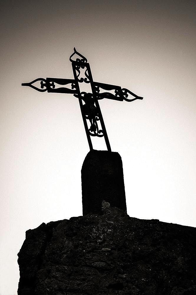 Twisted cross on a clear sky