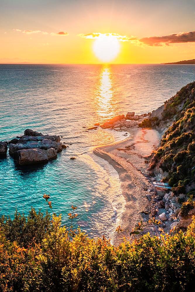 Small sandy beach at sunrise, coastal photo of sulphur (Sulfur) Beach, Zakynthos Island, Greece, Europe