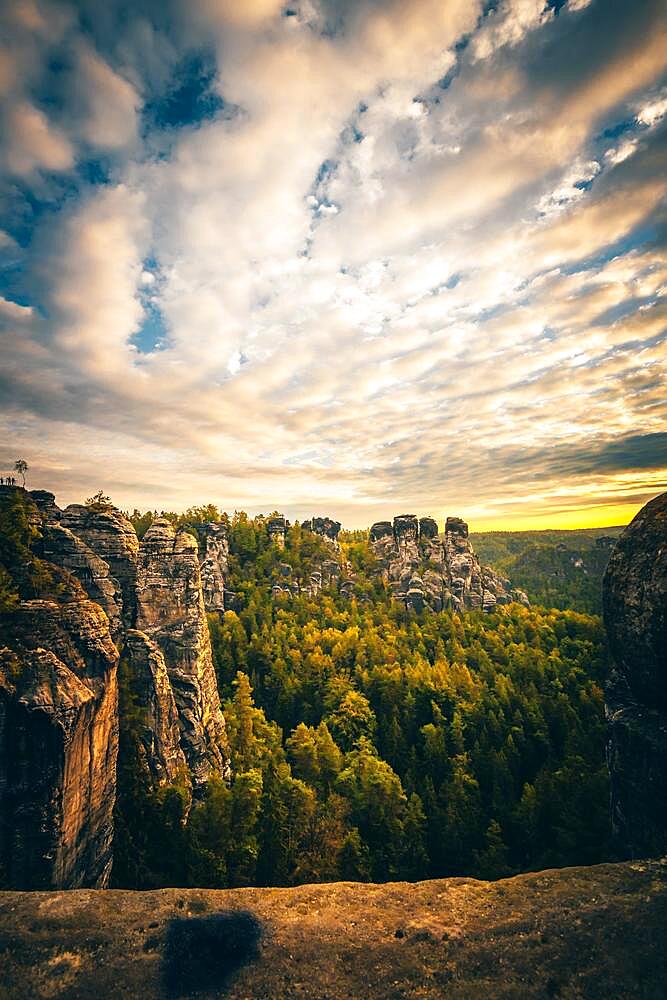 Schrammsteine with Falkenstein and Koenigstein at sunrise, Saxon Switzerland National Park, Elbe Sandstone Mountains, Saxony, Germany, Europe