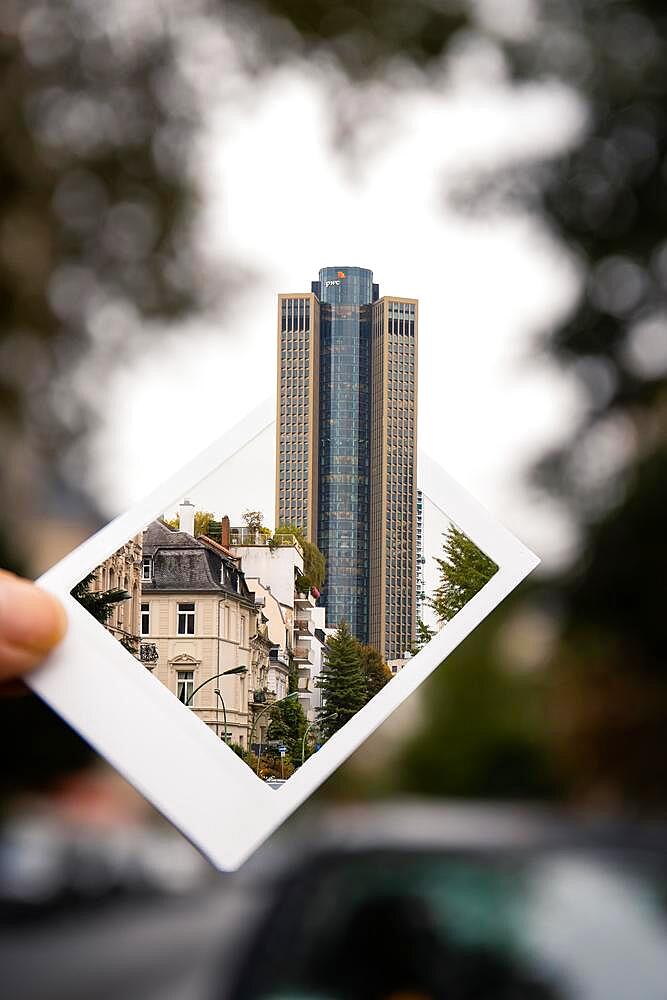 Photoshop trick, PWC or Tower 185 comes out of an instant picture, Frankfurt, Hesse, Germany, Europe