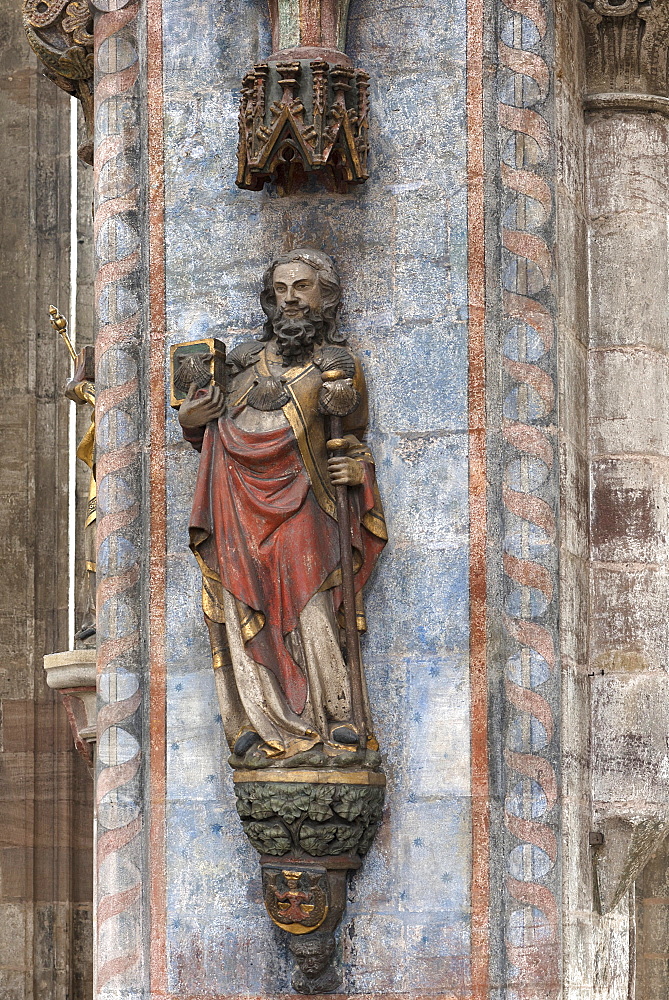 Coloured sculpture of the apostle Jacob the Elder, scallop shell and pilgrim's staff, 14th century St. Sebaldus Church, Middle Franconia, Bavaria, Germany, Europe