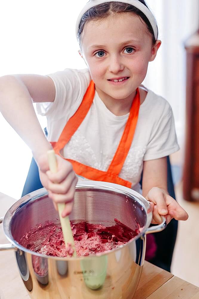 Girls baking with coloured dough