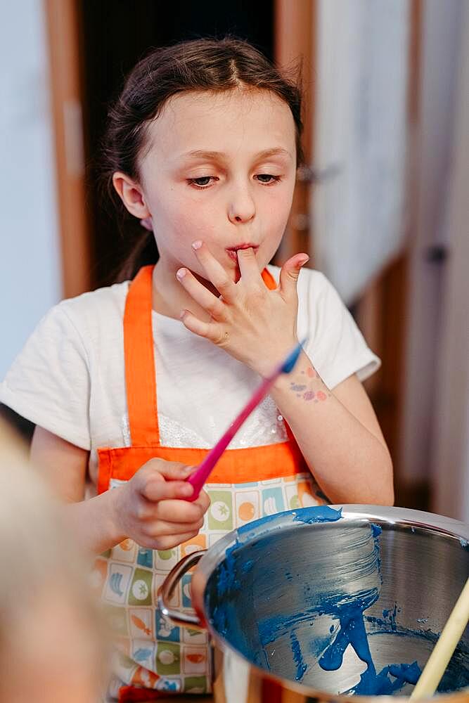 Girls baking with coloured dough