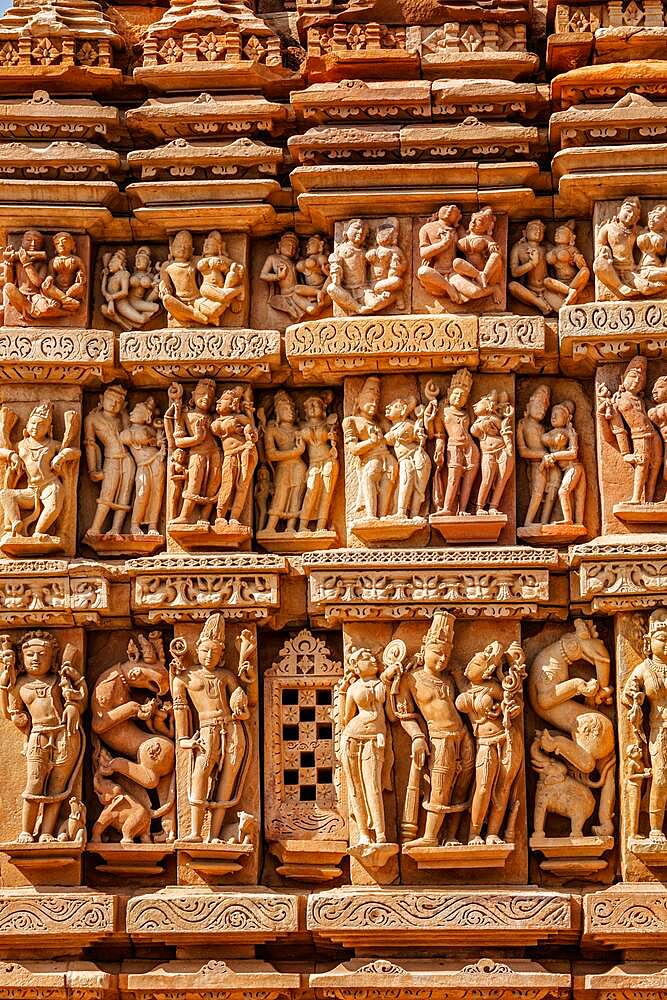 Stone carving bas relief sculptures on Vaman Temple, famous indian tourist site Khajuraho, Madhya Pradesh, India, Asia