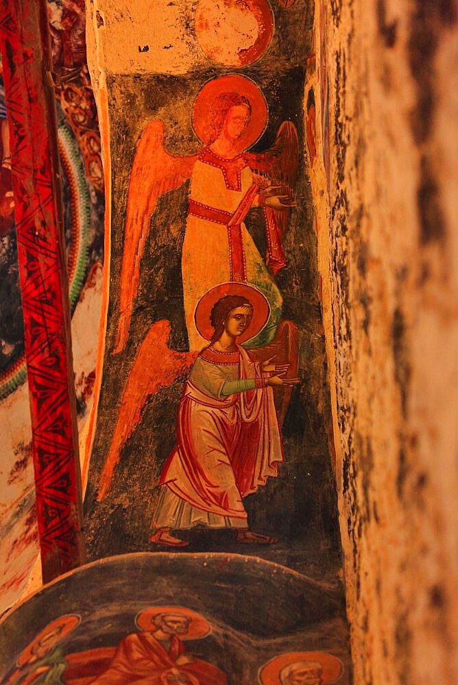 Former monastery church of Antifonitis, 12th century interior, frescoes and wall painting on the columns, North Cyprus