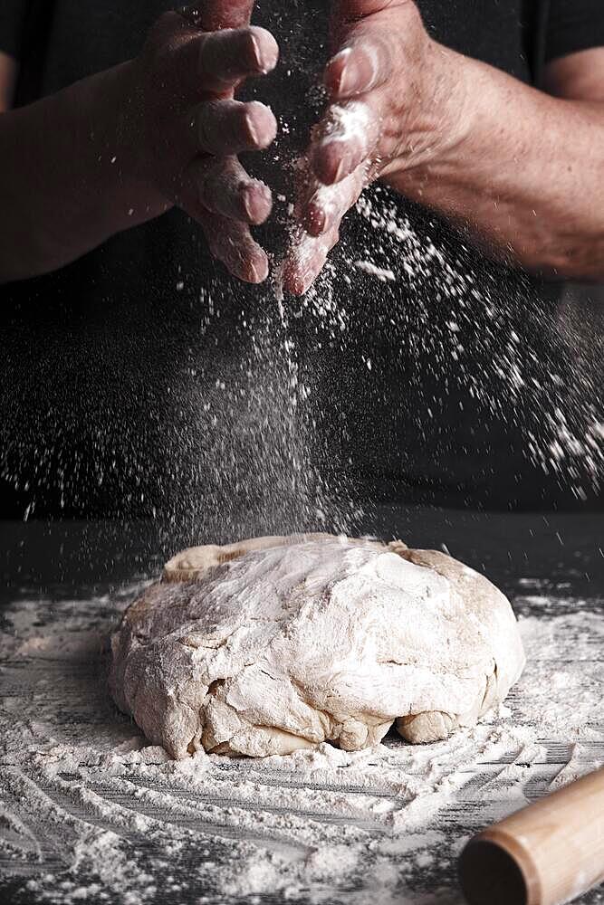 Cooking dough by elderly woman cook hands for homemade pastry bread, pizza, pasta recipe preparation on table background