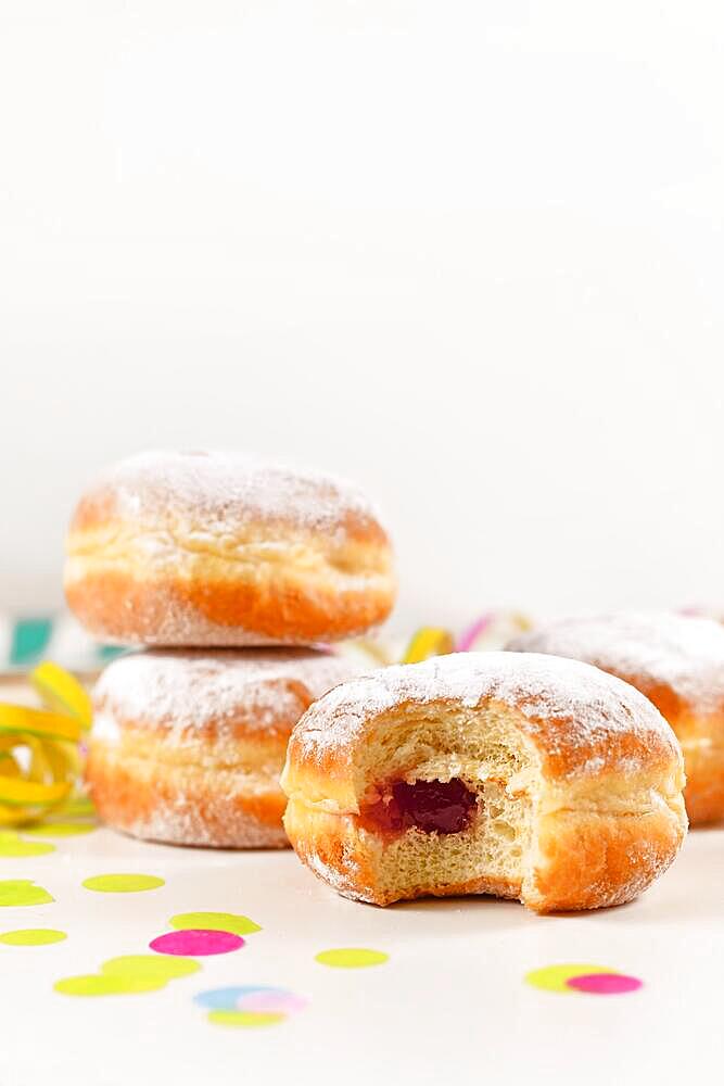 Berliner Pfannkuchen, a traditional German donut like dessert made from sweet yeast dough fried in fat with jam filling. Traditional served during carnival