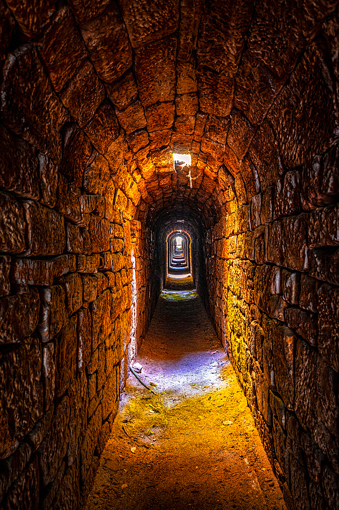 Underground escape tunnel made of old natural stones on the Rieseneck hunting estate, Kleineutersdorf, Thuringia, Germany, Europe