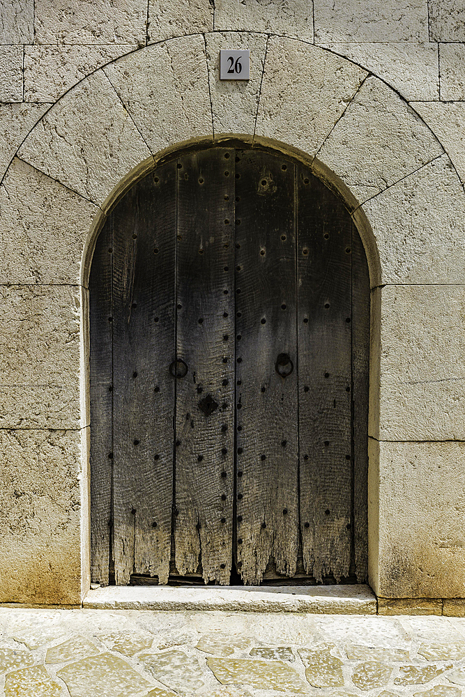 Old wooden door in wall