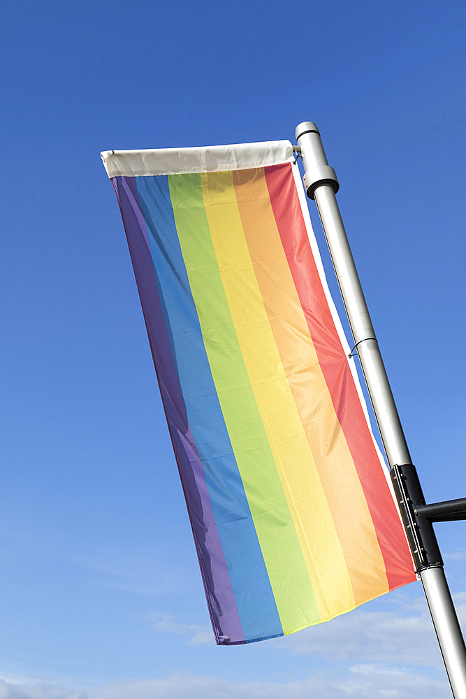 Symbolic image, homosexuality, tolerance, CSD, Pride Week, rainbow flag against blue sky, Germany, Europe