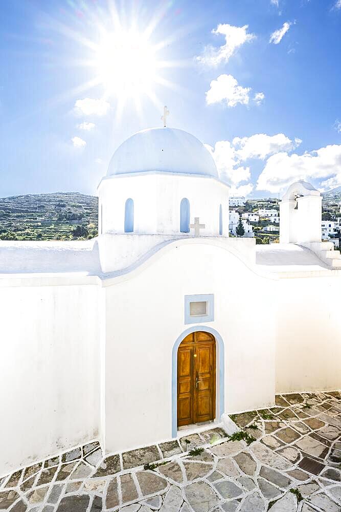 Greek Orthodox Chapel of Agios Spiridon with Star of the Sun, picturesque alleys of the village of Lefkes, Paros, Cyclades, Greece, Europe