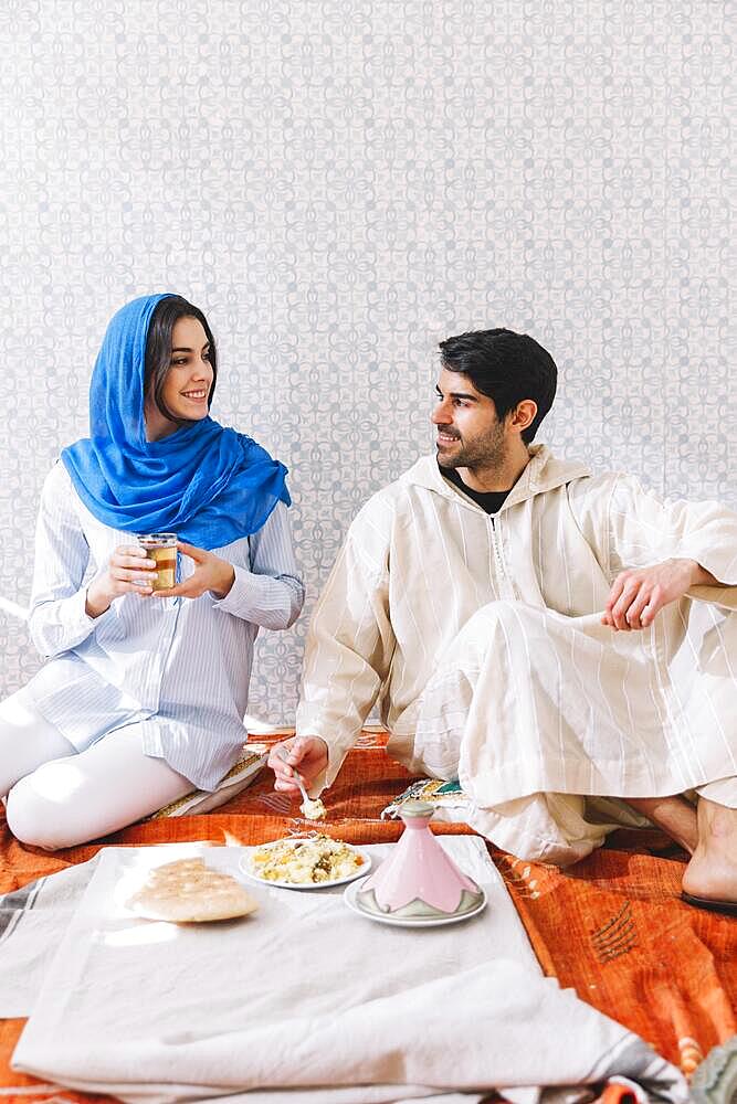 Muslim couple eating