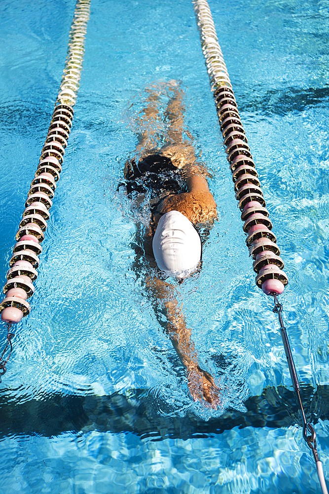 Young girl enjoying swimming pool